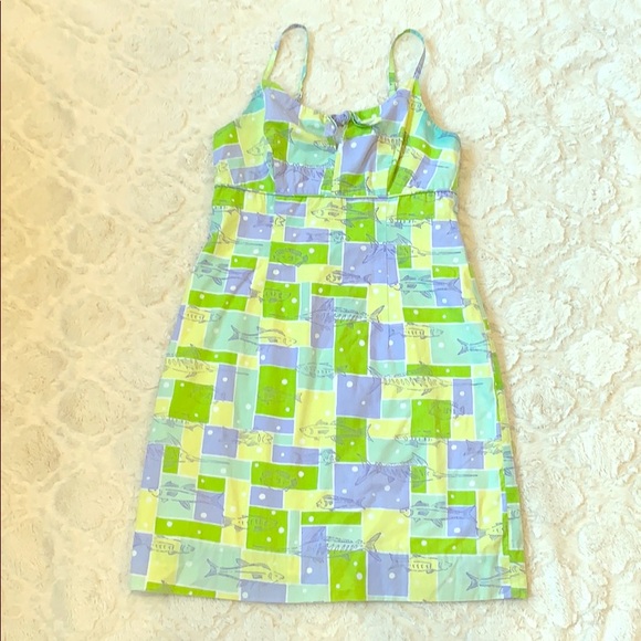 green dress with yellow fish